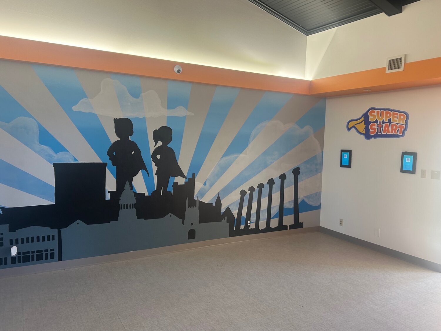 Mural in the lobby of the St. Raymond’s Society’s Super Start Preschool and infant care in Columbia.